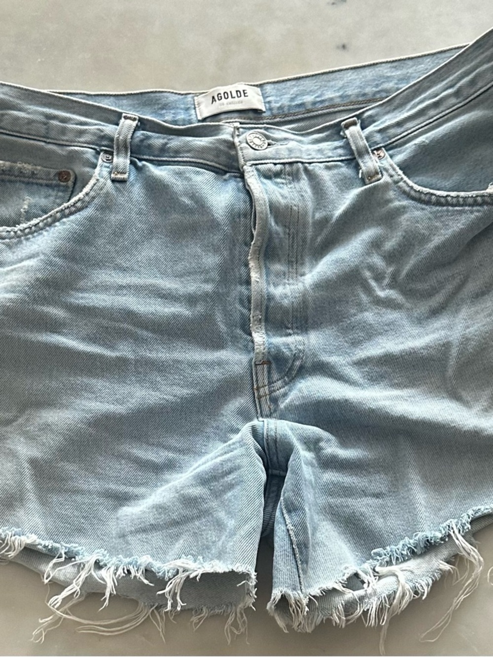 Agolde Light Wash Frayed Hem Denim Shorts